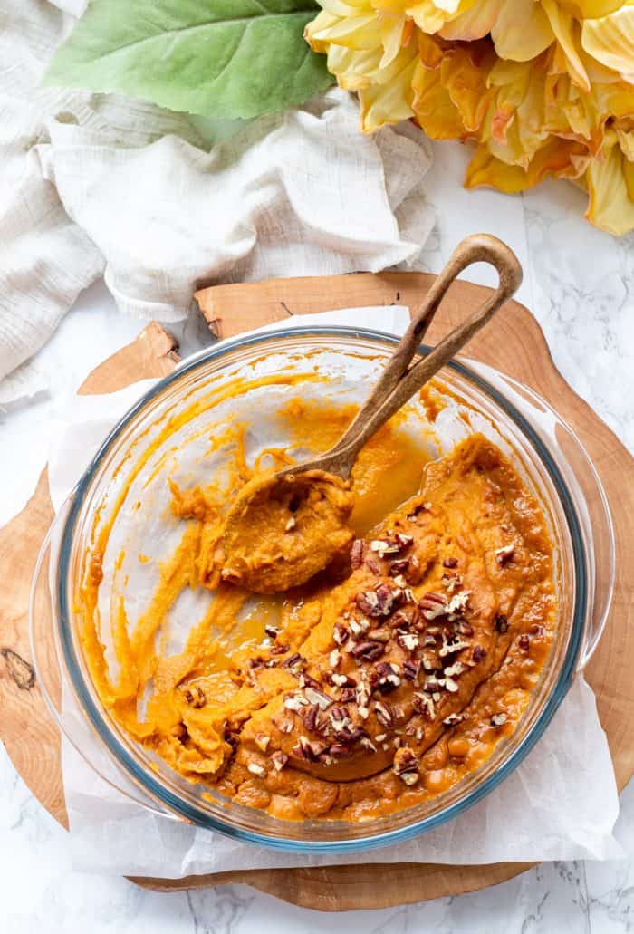 Half-empty bowl of healthy mashed sweet potatoes