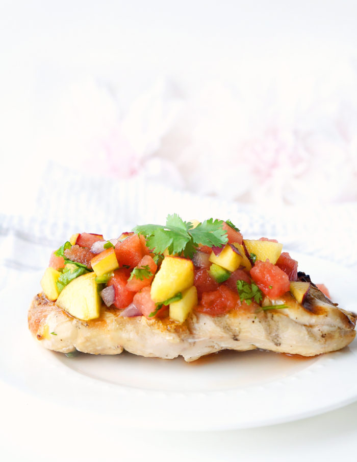 Cooked chicken breast topped with Watermelon Peach Salsa