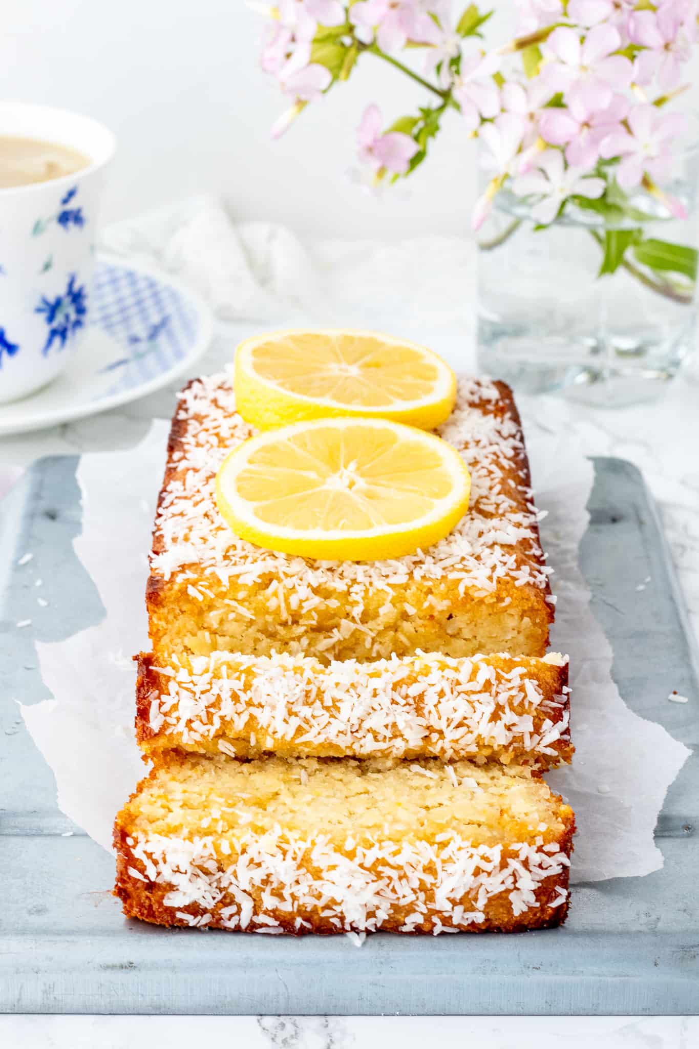Finished lemon loaf on a tray sliced into pieces