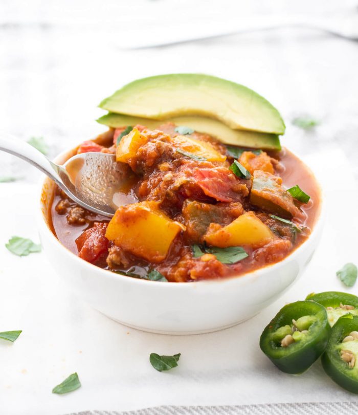 Spoon scooping Whole30 Pumpkin Chili
