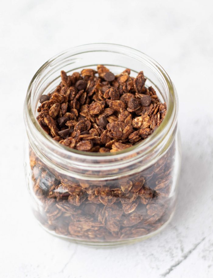 Side view of a jar of double chocolate granola