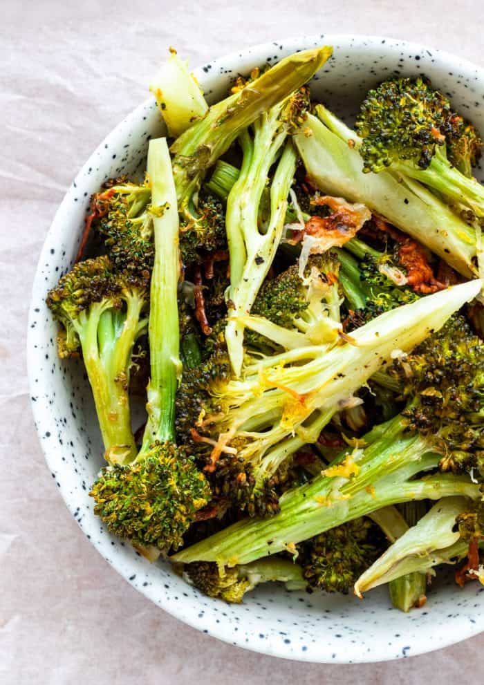 A bowl of roasted broccoli ready to serve.