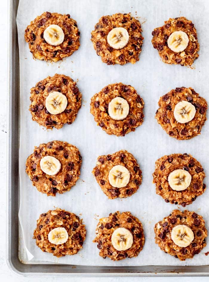 The baked healthy banana cookies on a baking sheet.