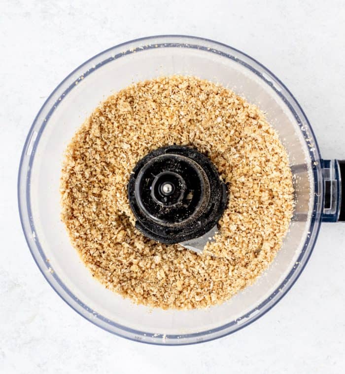 Ground nuts and oats in food processor