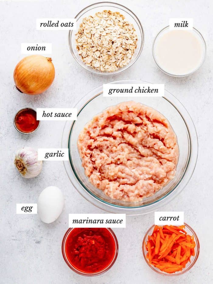 ingredients for chicken muffins on grey background with labels