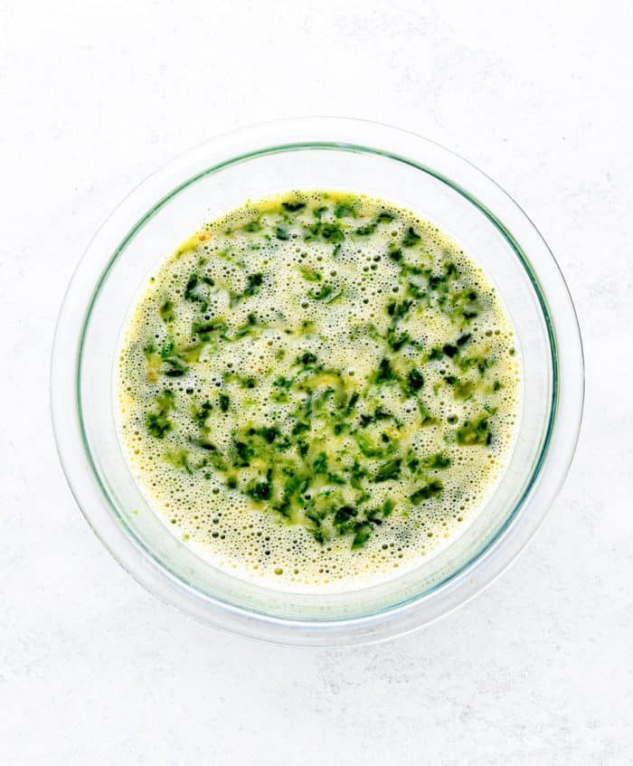 egg and spinach mixture in a glass bowl