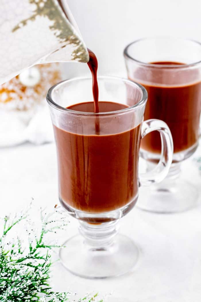 Healthy hot chocolate being poured into a glass