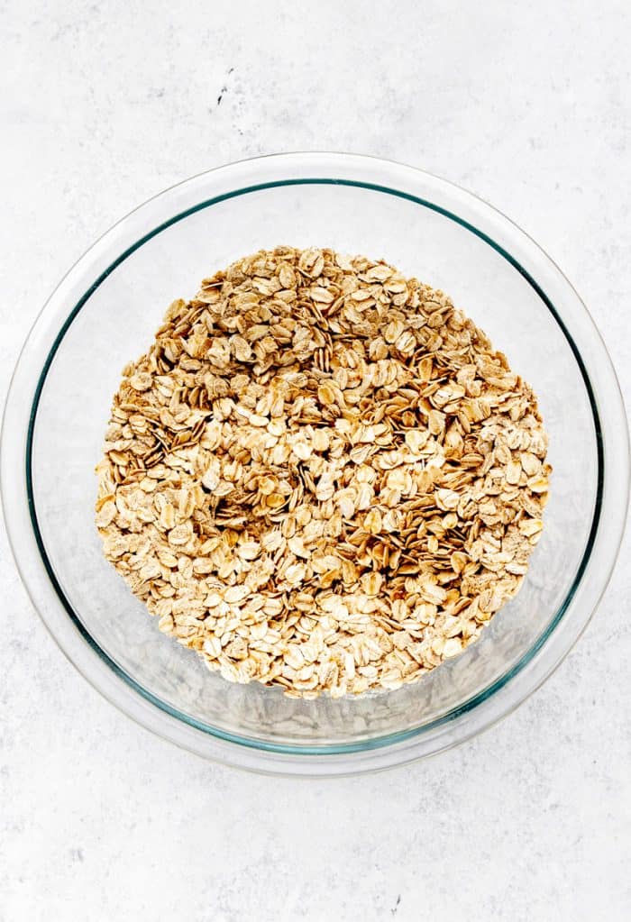 Dry ingredients for oat muffins in a bowl.