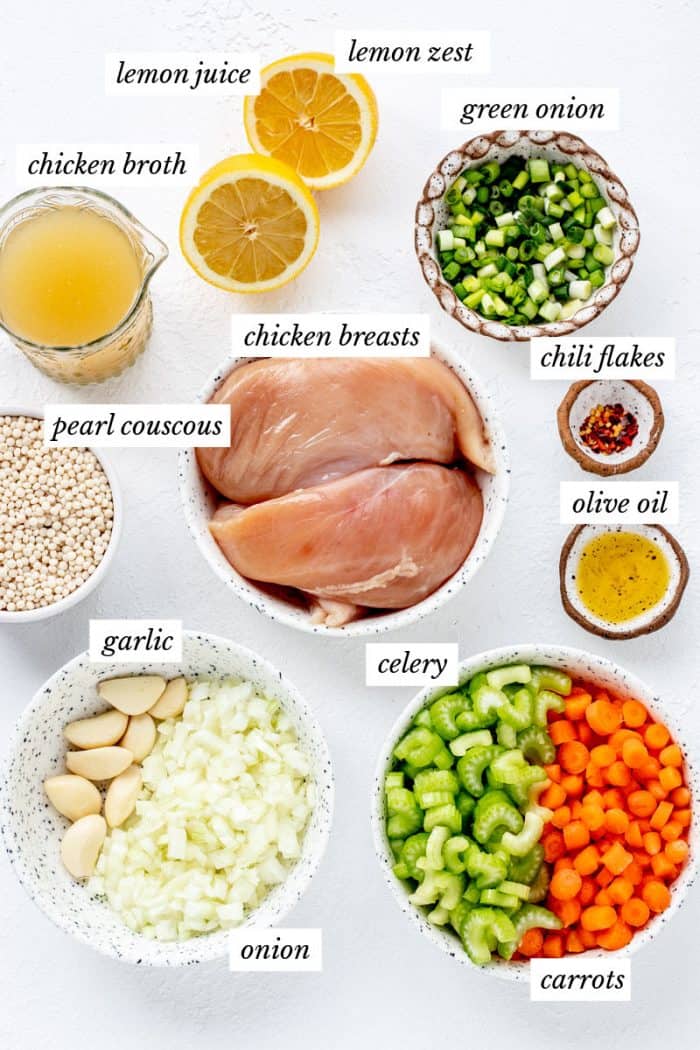 Ingredients for healthy chicken soup recipe with labels.