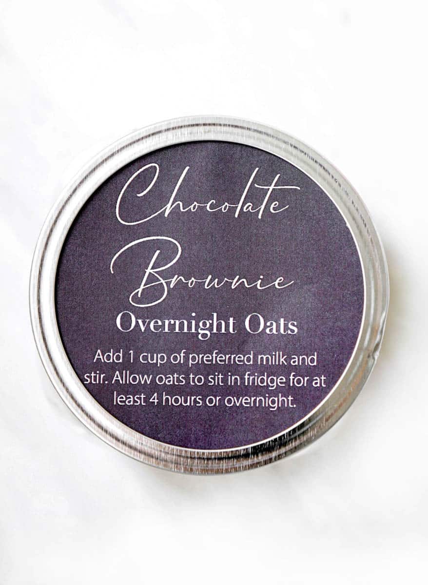 Overhead shot of chalkboard label that says "chocolate brownie overnight oats."
