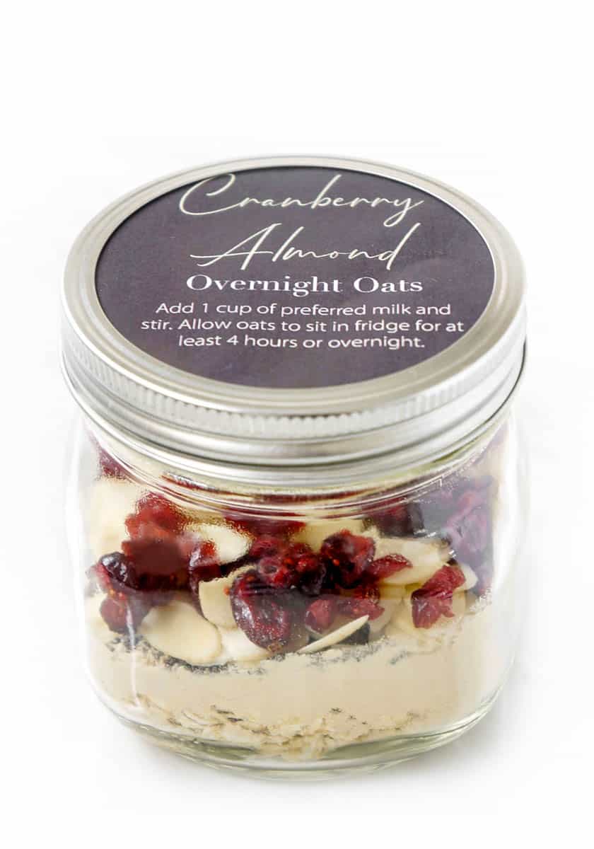Cranberry almond overnight oats in mason jar with label.