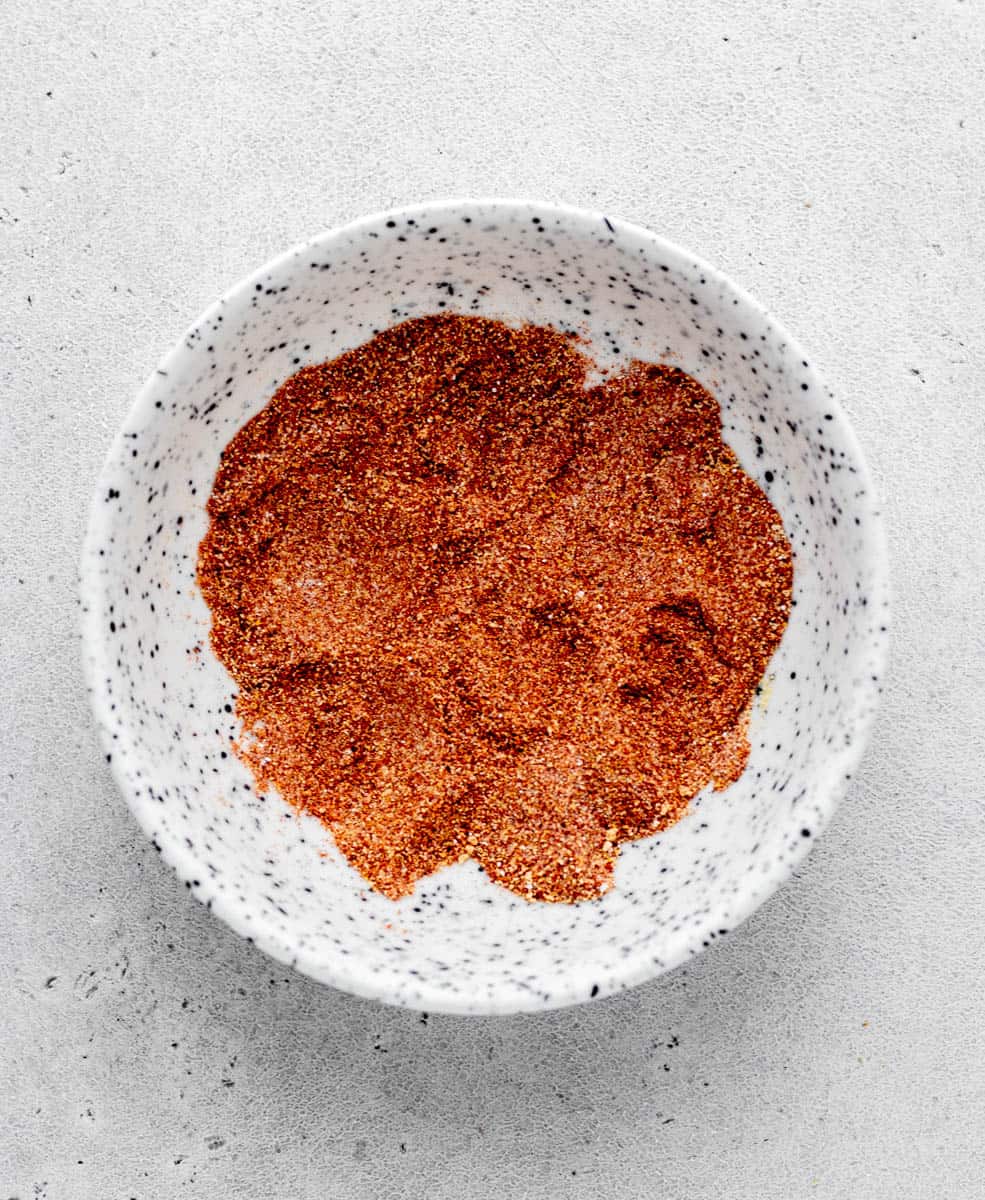 A bowl of blended spices and baking soda for air fryer chicken wings.